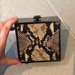 Henri Bendel faux snake skin clutch